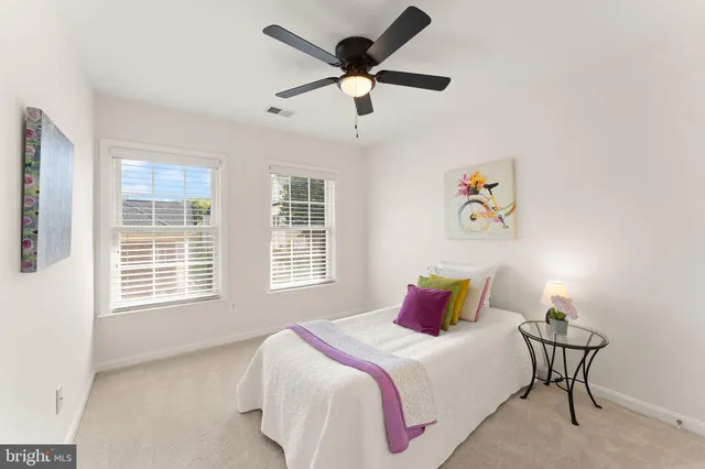an aerial view of a house with a garden