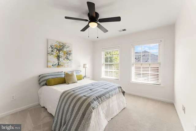 an aerial view of a city with lots of residential buildings