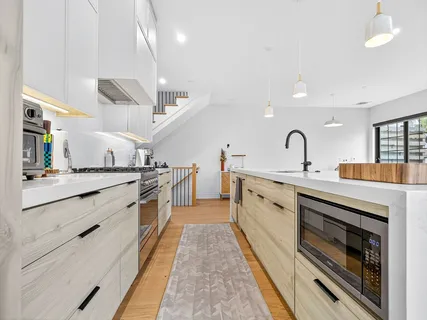 a living room with furniture and window