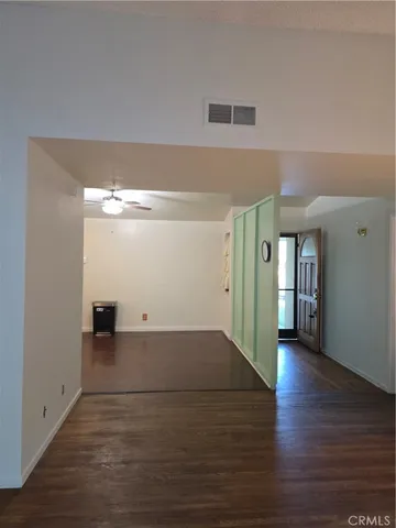 a kitchen with a refrigerator and a sink