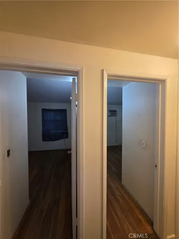 a bathroom with a shower and toilet