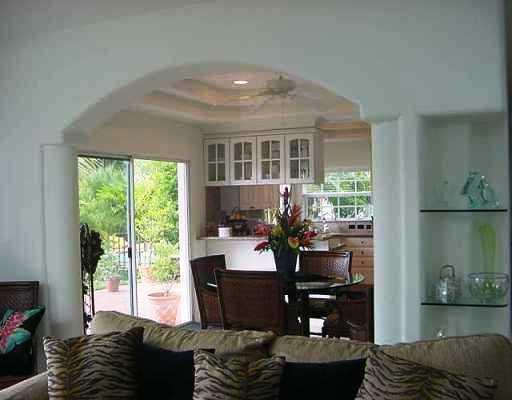 800 Southwest Salerno Road Stuart, FL 34997 - Photo 5 of 8 a living room with furniture and a large window