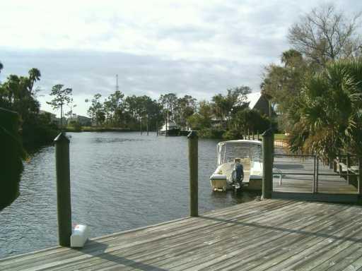 800 Southwest Salerno Road Stuart, FL 34997 - Photo 7 of 8 a terrace with view of outdoor space