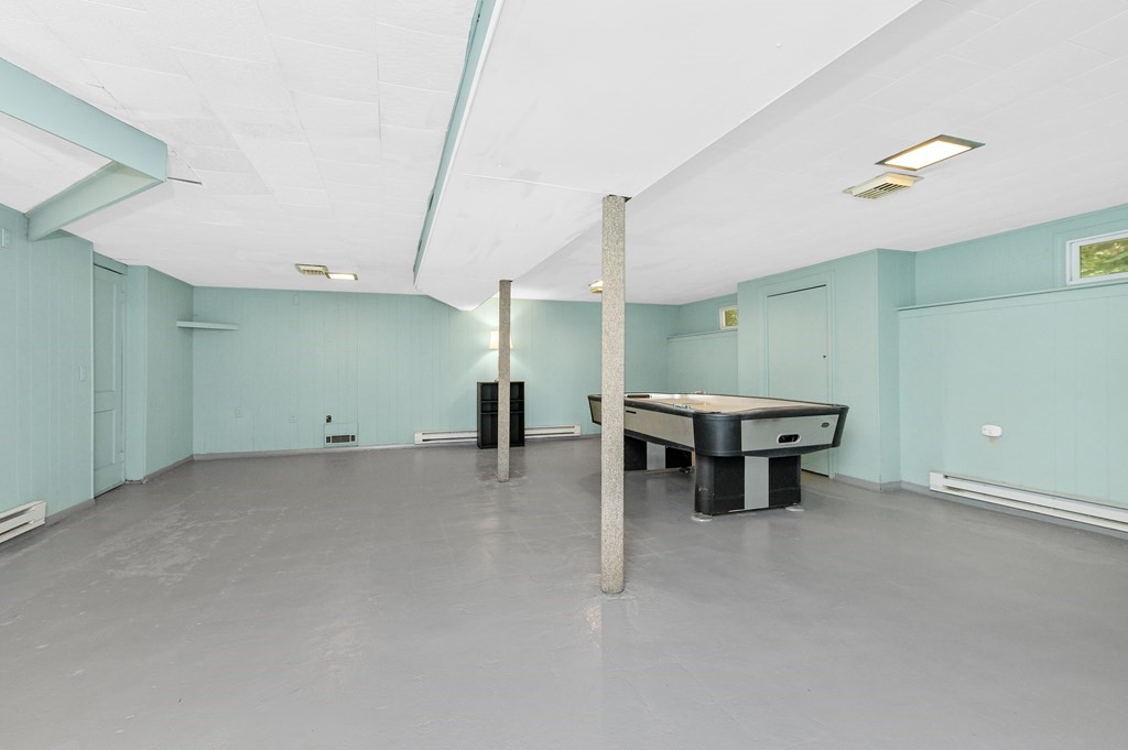 157 Spring Street Stoneham, MA 02180 - Photo 32 of 34 a view of an empty room with a window