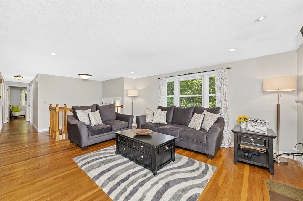 157 Spring Street Stoneham, MA 02180 - Photo 5 of 34 a living room with furniture and a window