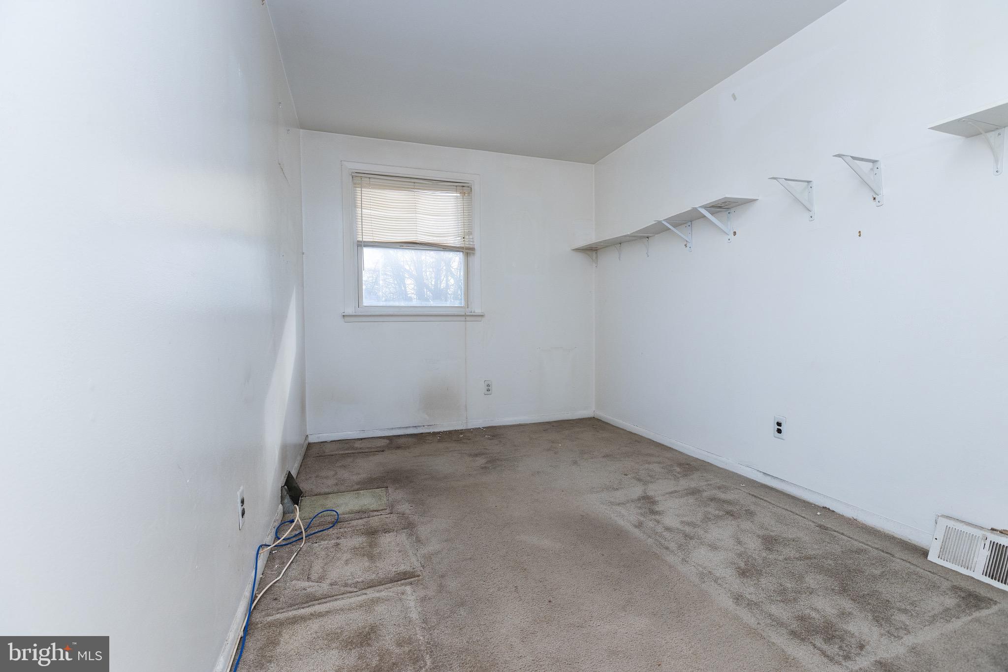 223 Alnus Street Philadelphia, PA 19116 - Photo 16 of 30 an empty room with a windows