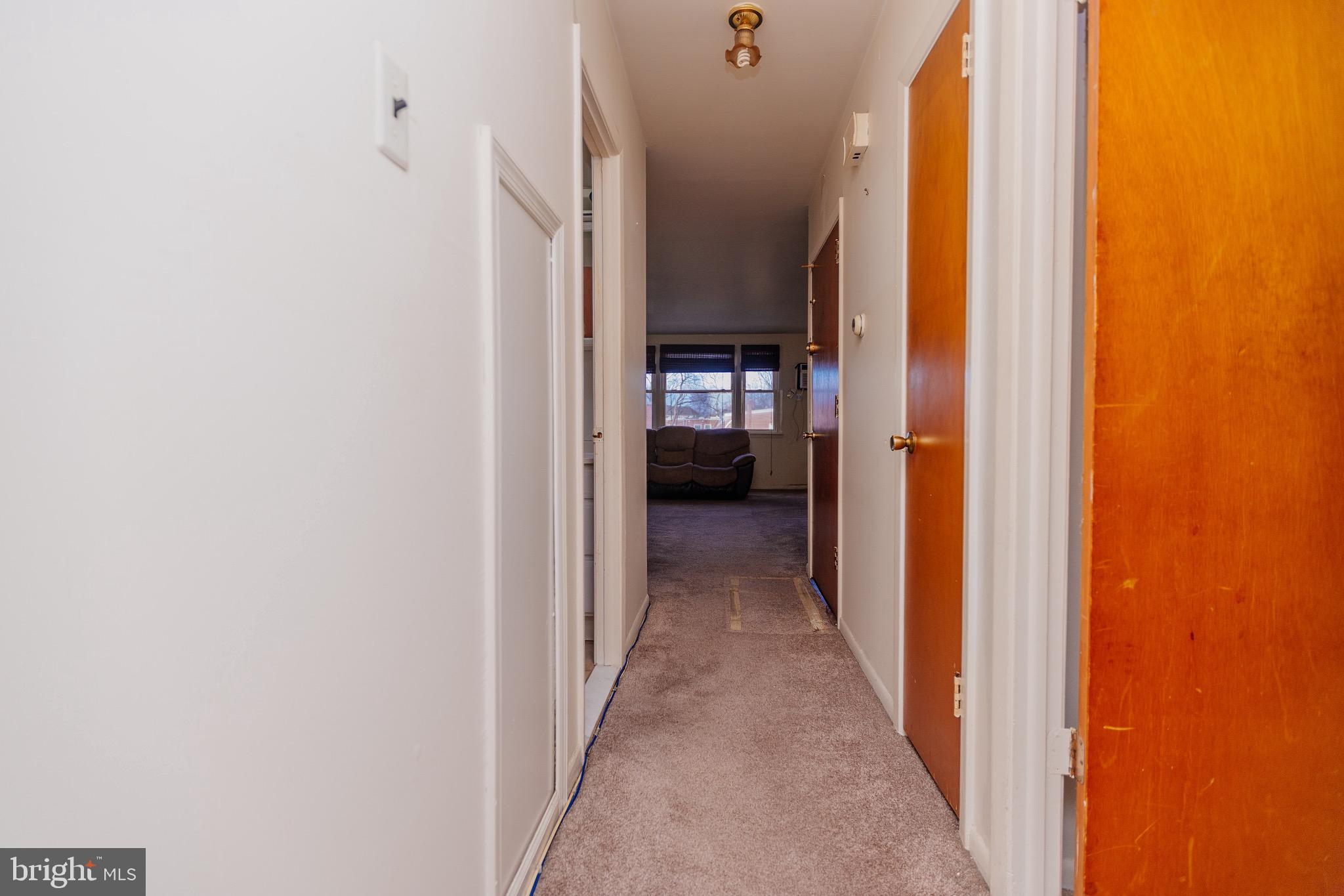 223 Alnus Street Philadelphia, PA 19116 - Photo 19 of 30 a view of a hallway with a bathroom