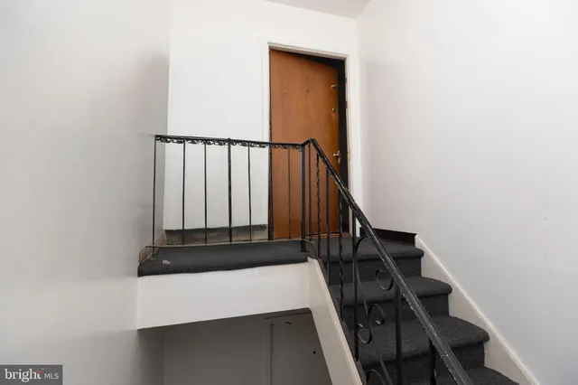 a view of a storage & utility room with washer and dryer