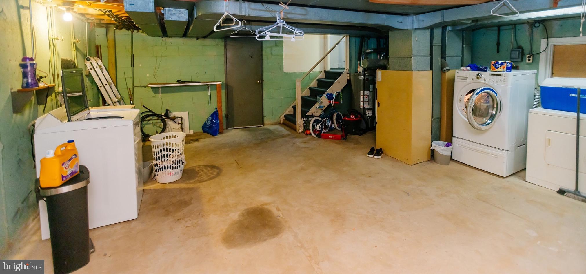 223 Alnus Street Philadelphia, PA 19116 - Photo 23 of 30 a view of a storage & utility room with washer and dryer