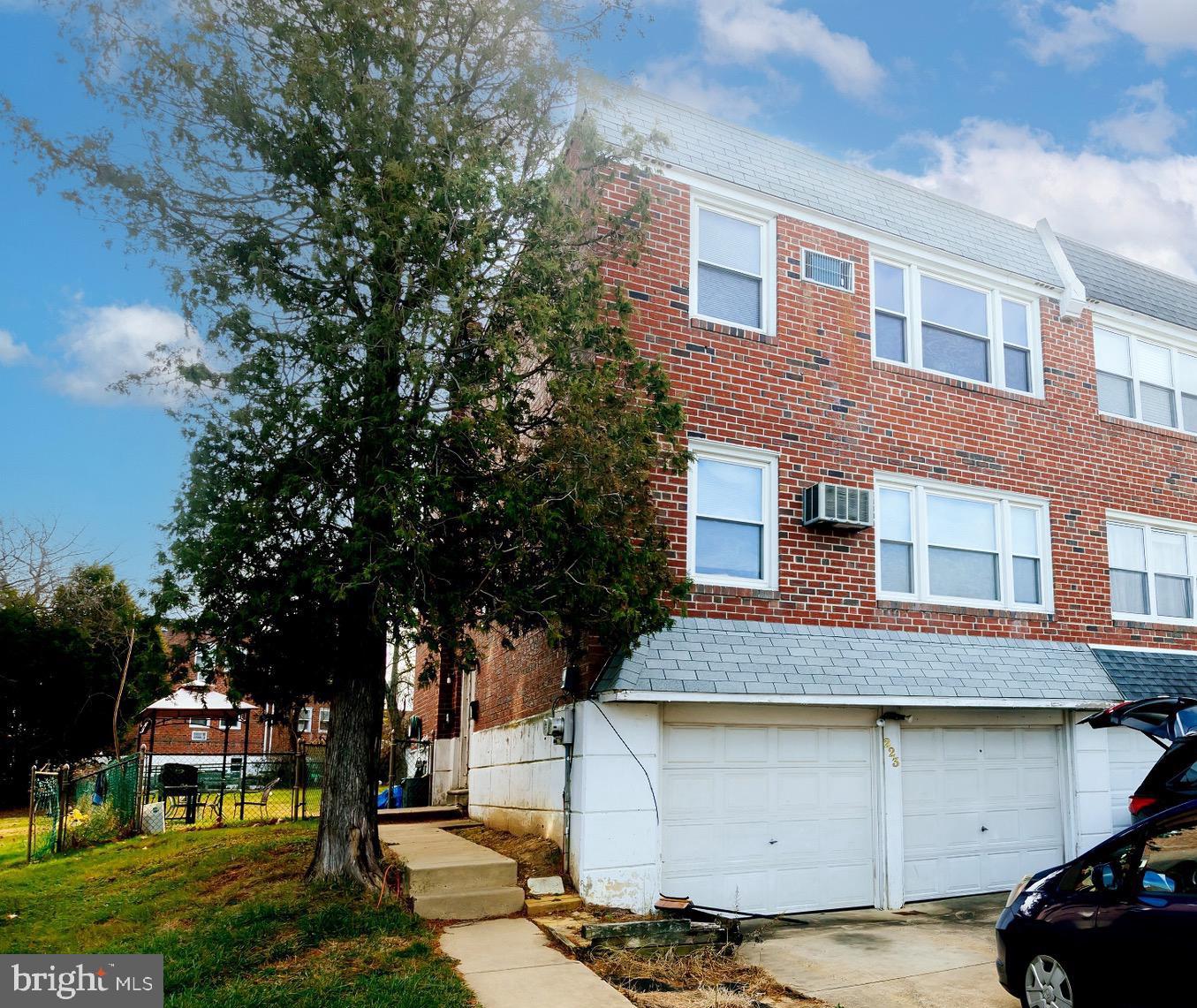 223 Alnus Street Philadelphia, PA 19116 - Photo 30 of 30 a front view of a house with a garden