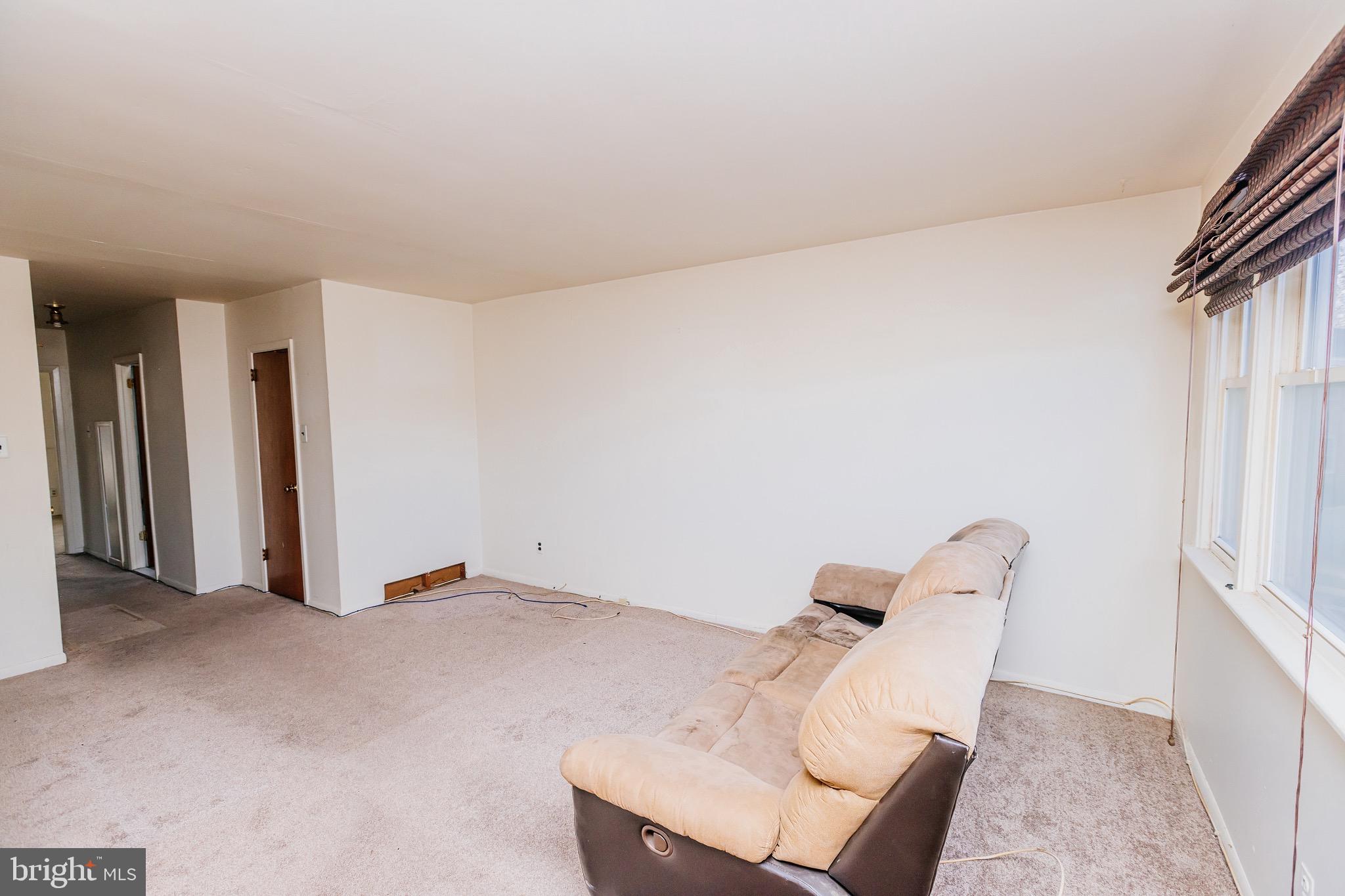 223 Alnus Street Philadelphia, PA 19116 - Photo 8 of 30 a view of wooden floor and chair in a room