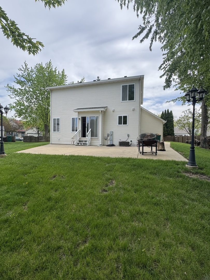 1716 William Drive Romeoville, IL 60446 - Photo 17 of 18 a house view with outdoor space and garden