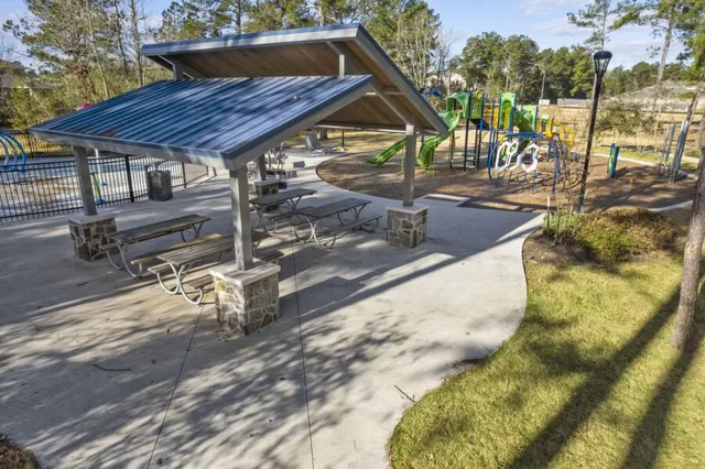 a view of a backyard with a patio