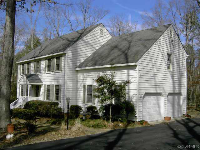 14001 Princess Mary Road Chesterfield, VA 23838 - Photo 2 of 10 a front view of a house with garden