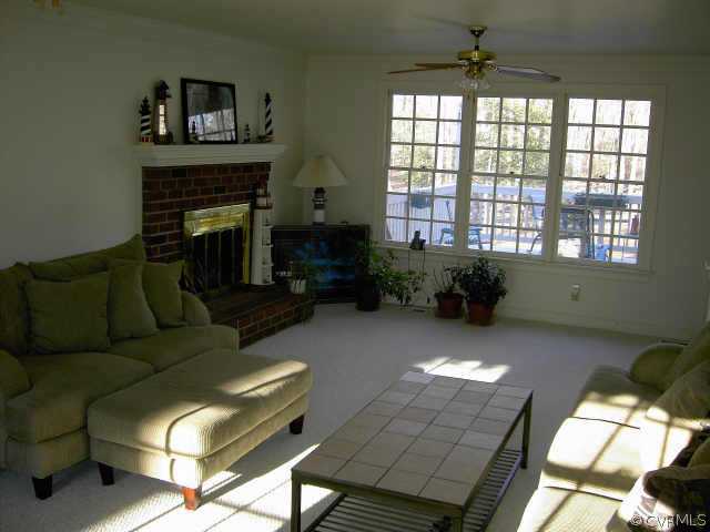14001 Princess Mary Road Chesterfield, VA 23838 - Photo 6 of 10 a living room with furniture and a fireplace