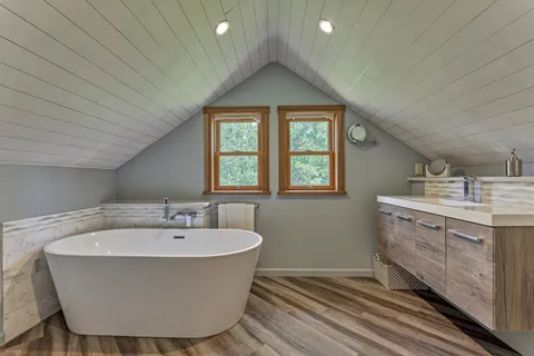 a bathroom with a sink and a bathtub