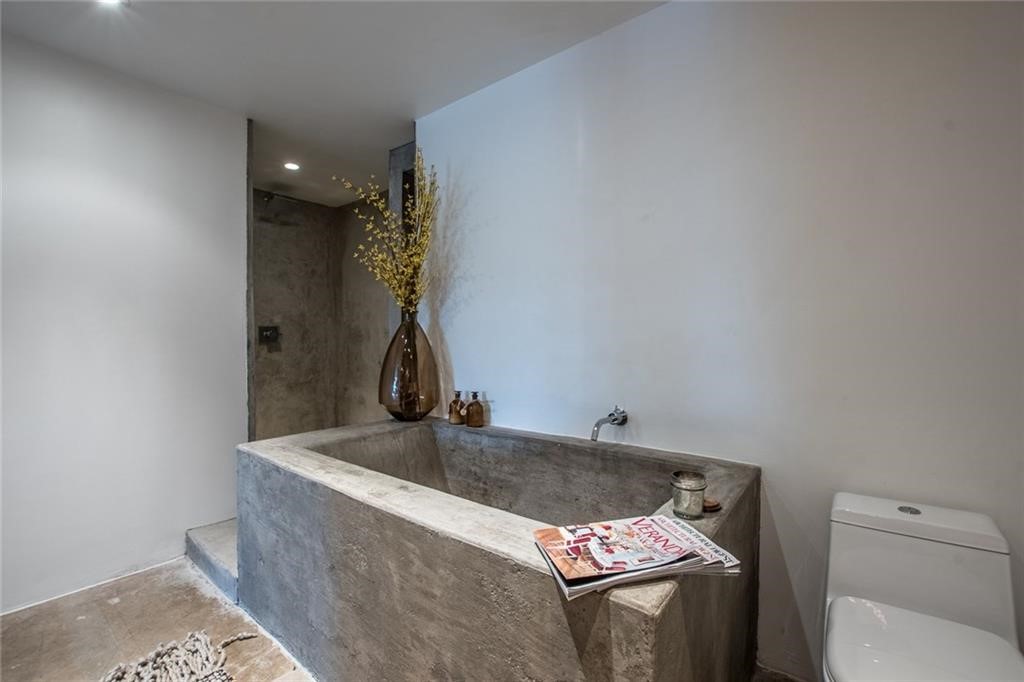 901 North Upper Broadway, Unit 206 Corpus Christi, TX 78401 - Photo 33 of 40 a room with a sink and toilet