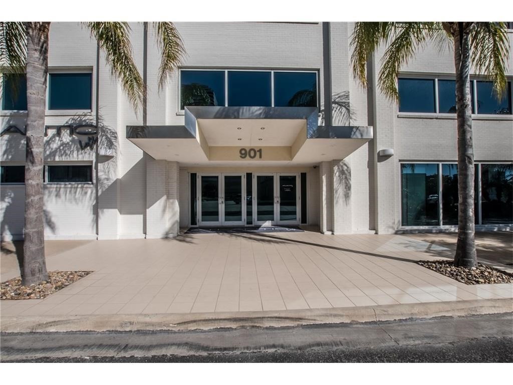 901 North Upper Broadway, Unit 206 Corpus Christi, TX 78401 - Photo 4 of 40 a view of house with yard and staircase