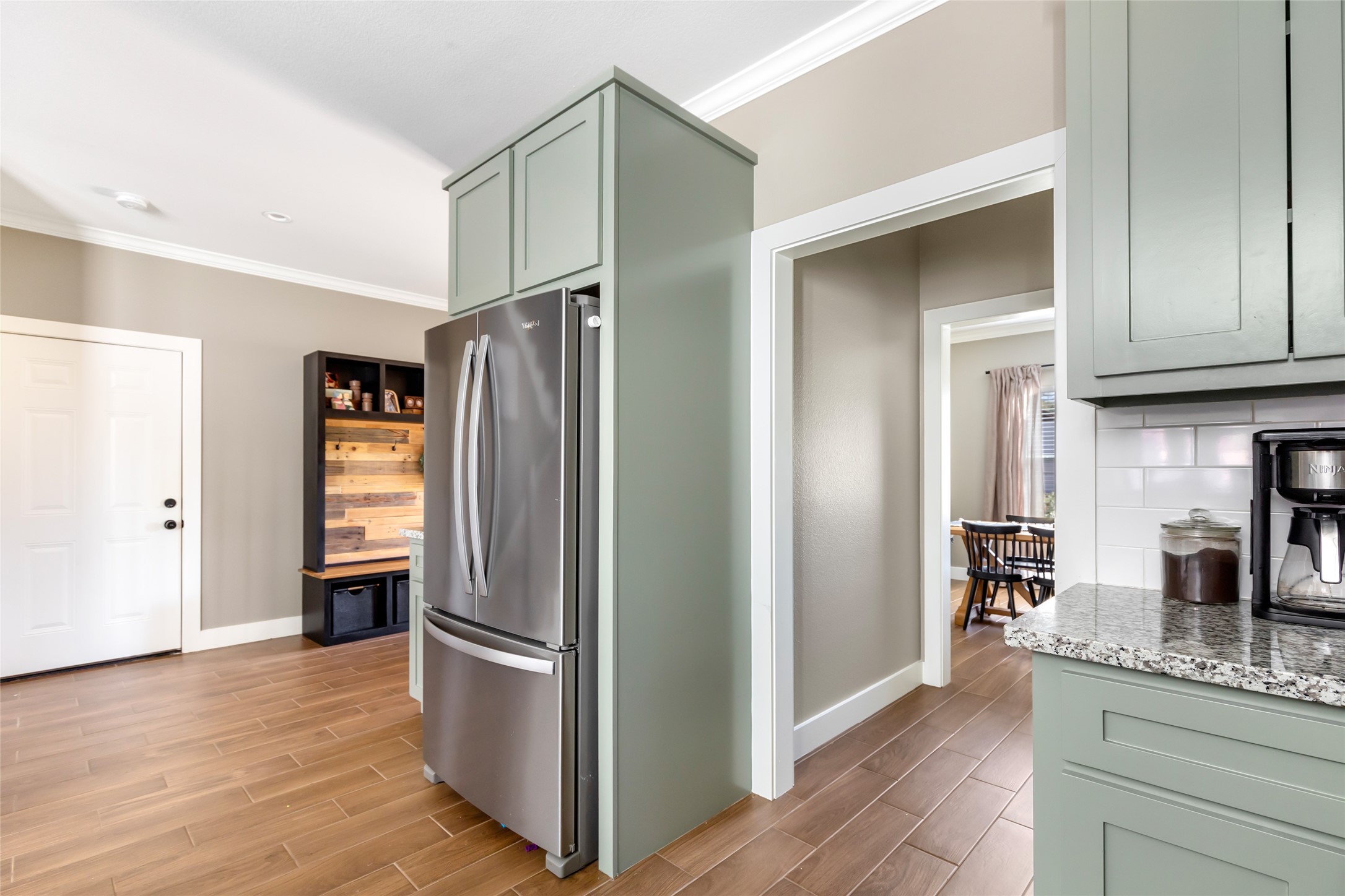 2201 Maple Street Liberty, TX 77575 - Photo 13 of 34 a kitchen with stainless steel appliances granite countertop a refrigerator and a sink