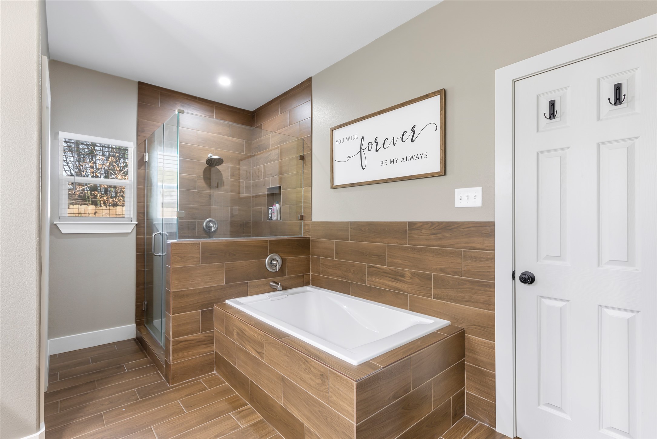 2201 Maple Street Liberty, TX 77575 - Photo 24 of 34 a bathroom with a sink a mirror and a shower