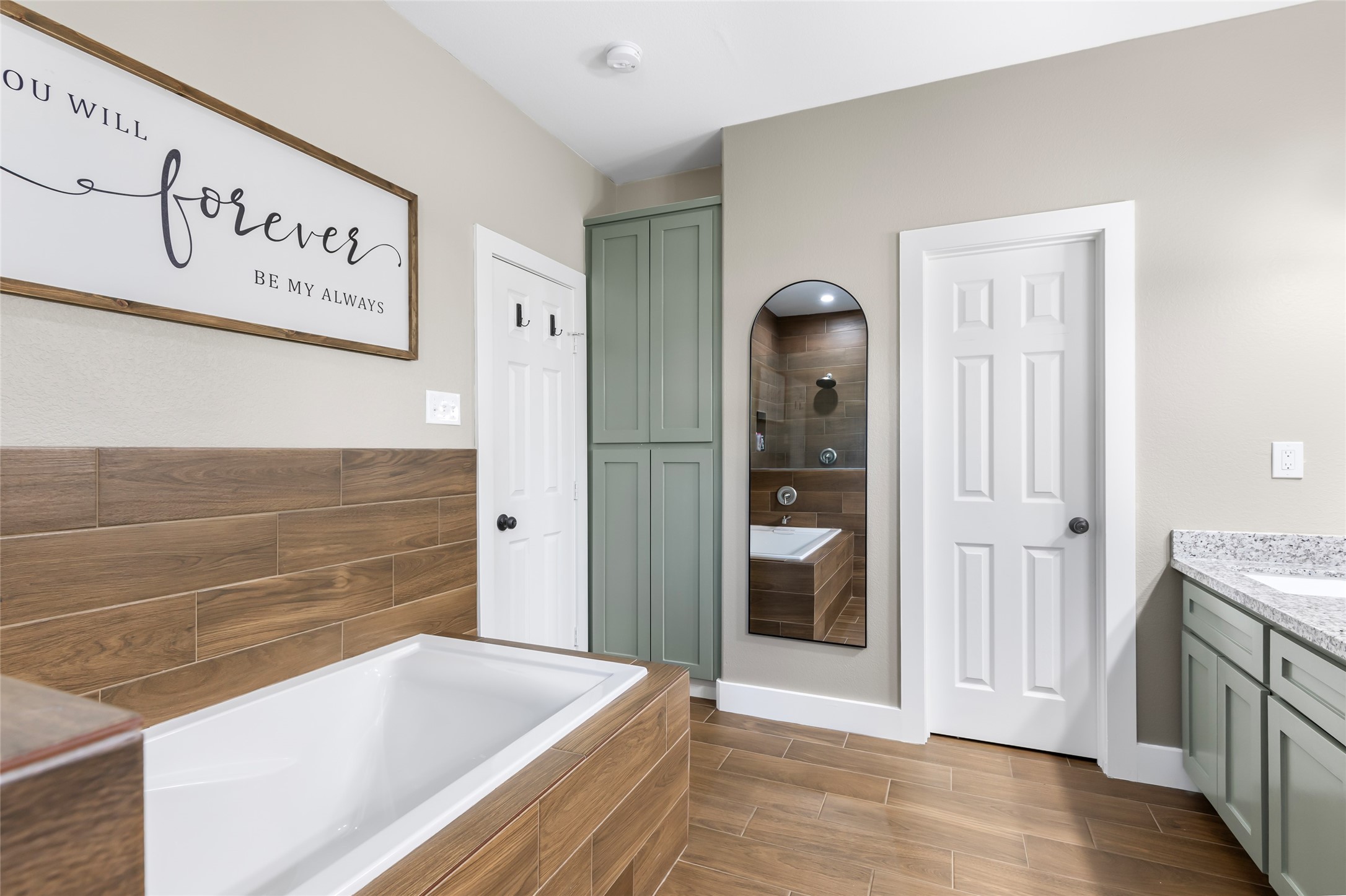 2201 Maple Street Liberty, TX 77575 - Photo 25 of 34 a bathroom with bathtub and shower