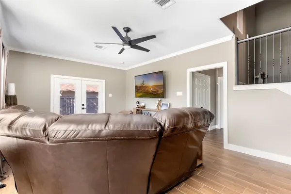 a room with a sink and cabinets