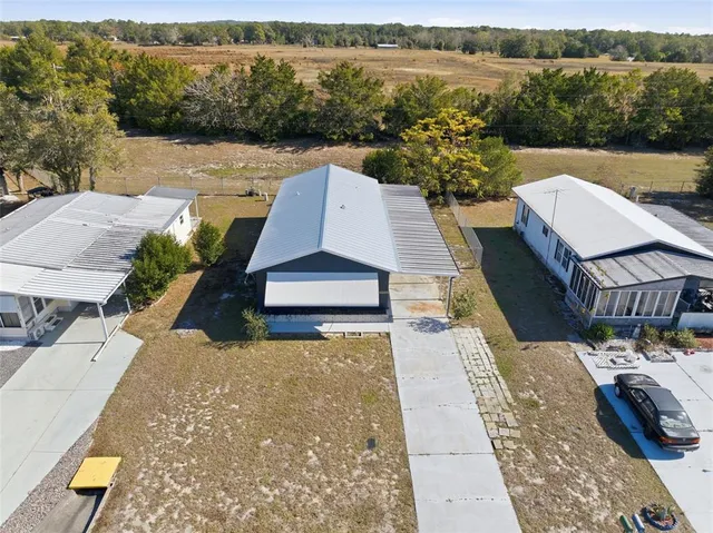swimming pool view with a lake view
