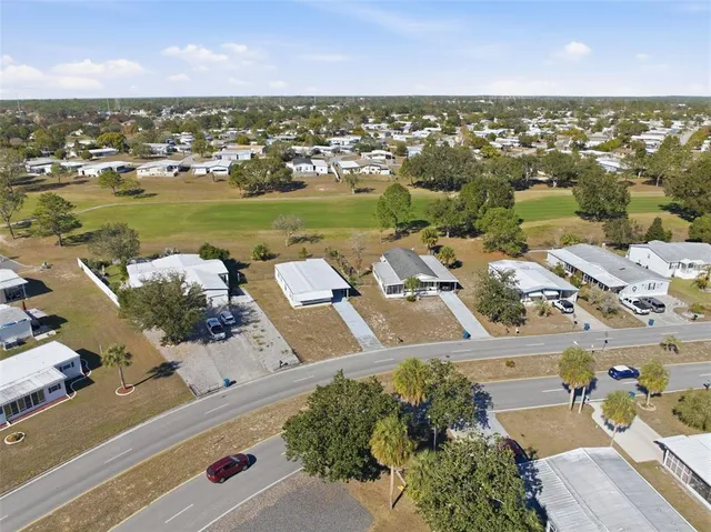 a view of a house with a swimming pool