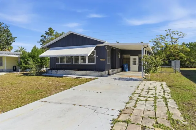 a view of a house with a swimming pool
