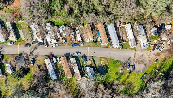 a view of a city with mountains in the background