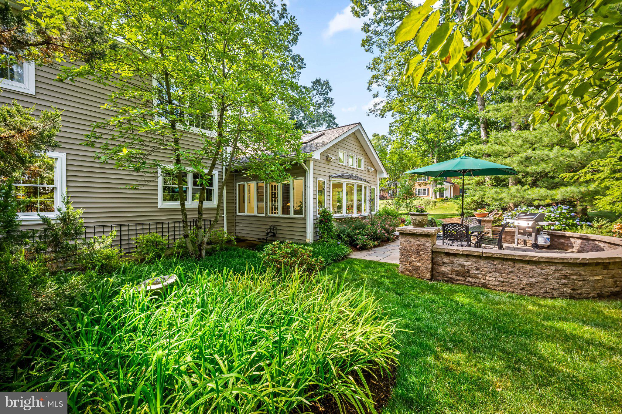 381 Sheffield Road Severna Park, MD 21146 - Photo 26 of 61 Serene garden retreat with lush greenery.