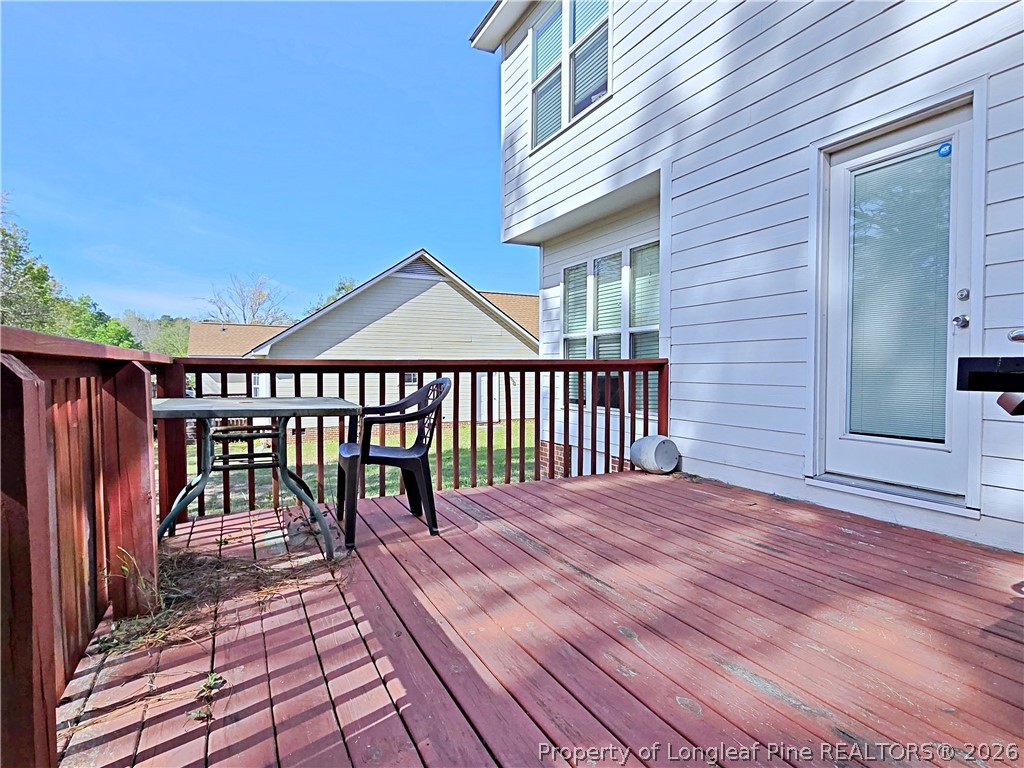 5218 Pringle Way Hope Mills, NC 28348 - Photo 39 of 43 a view of a house with wooden deck