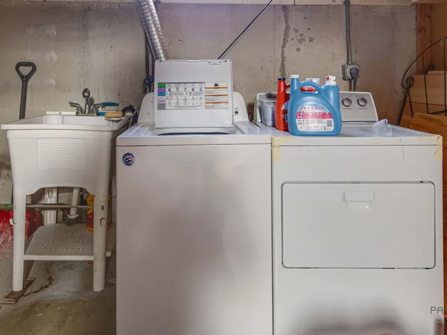 a utility room with dryer and washer