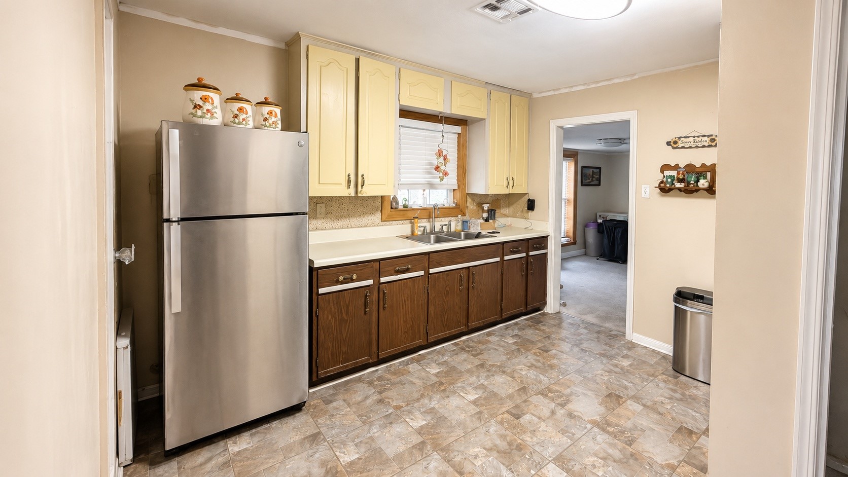 7622 Azalea Street Houston, TX 77023 - Photo 9 of 10 Well-maintained kitchen offering generous counter space, abundant cabinetry and easy access to adjacent living areas.