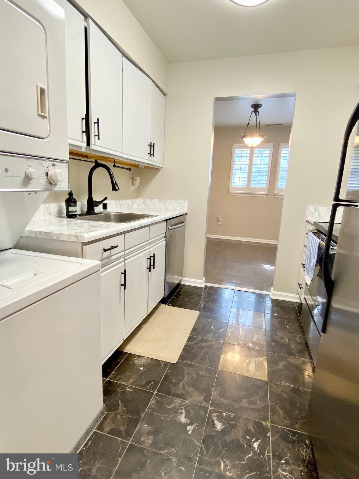 8601 Falls Run Road, Unit E Ellicott City, MD 21043 - Photo 3 of 18 Gally kitchen
