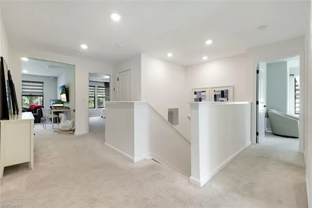 a view of a living room a livingroom with furniture and a flat screen tv
