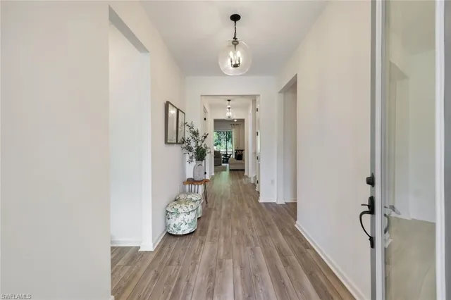 a view of entryway with livingroom