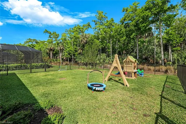 a view of a park with swings