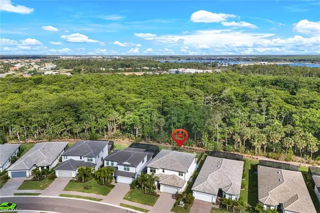 an aerial view of a house with a garden