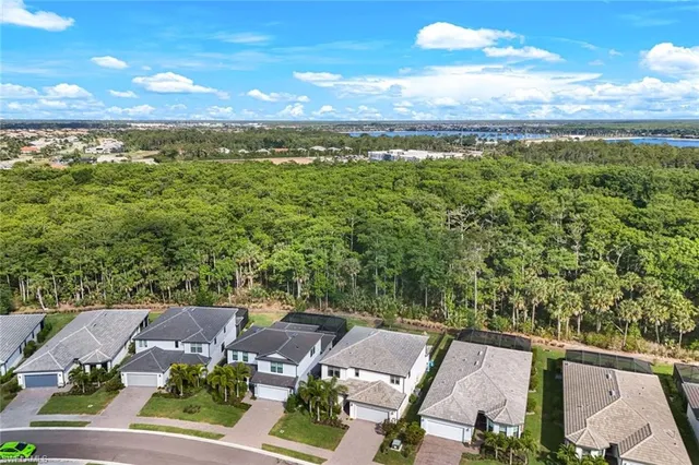 an aerial view of a house with a garden
