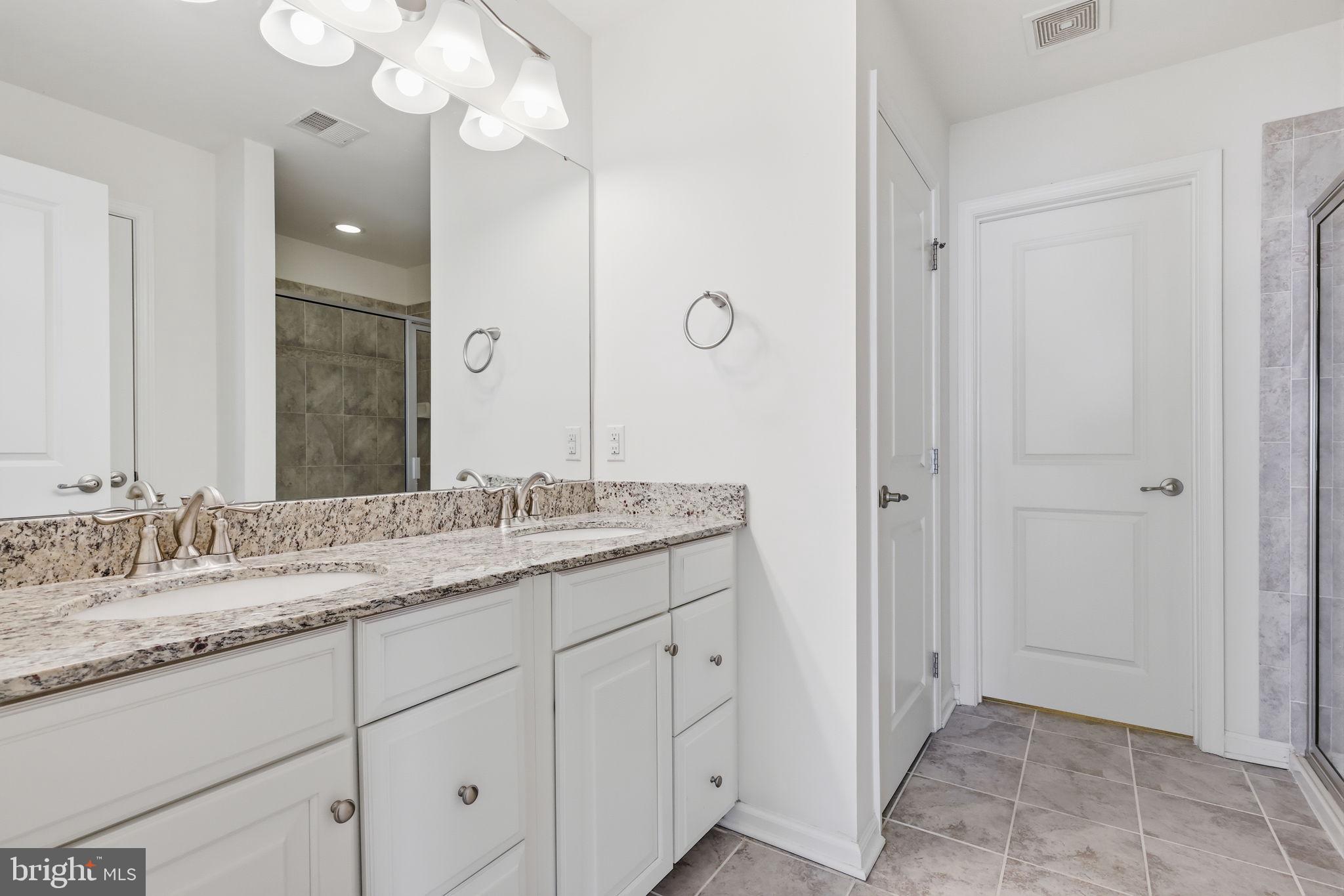 7 Montella Circle Pottstown, PA 19464 - Photo 39 of 61 Primary bath w/ double bowl vanity w/ granite