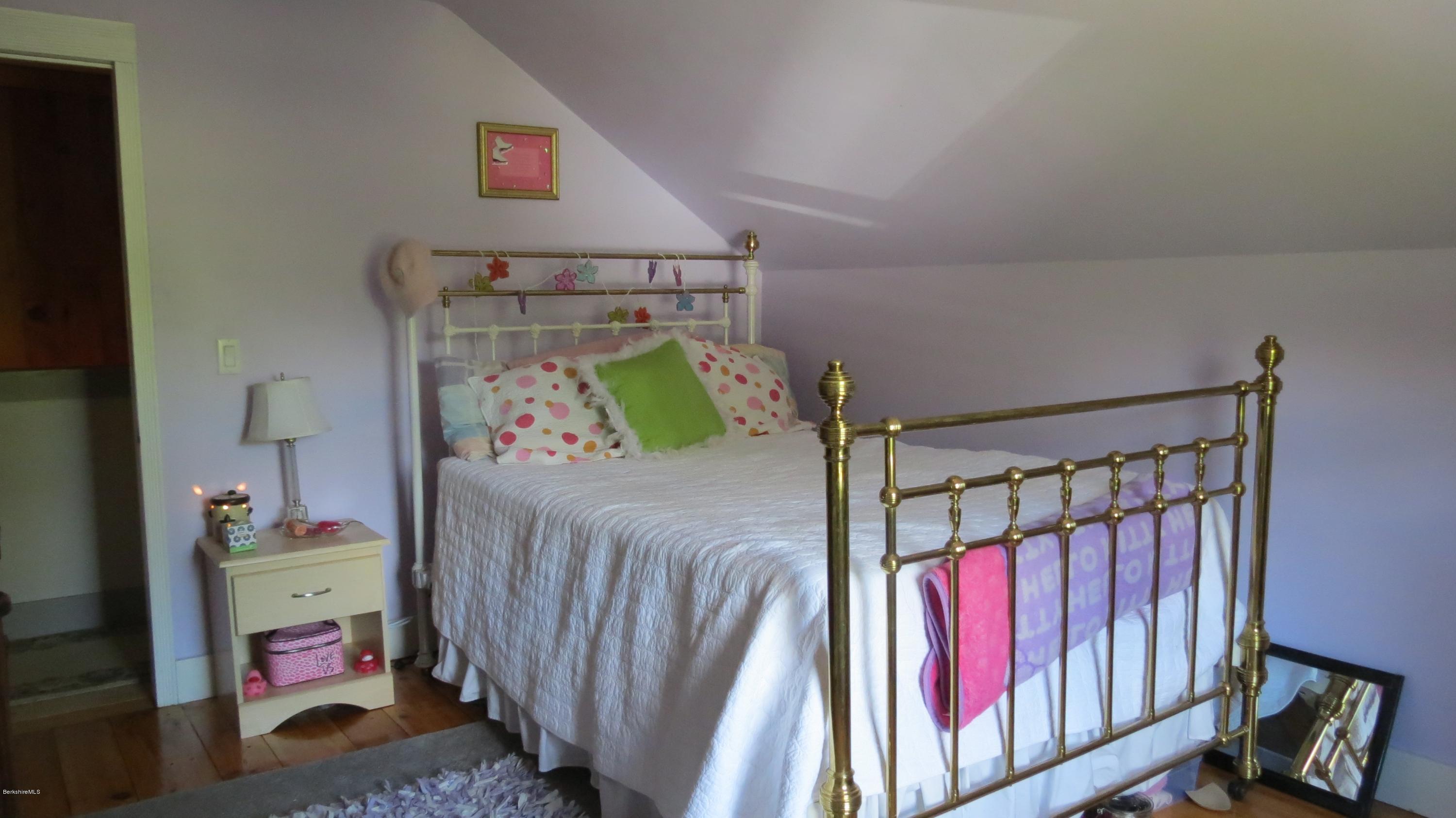 1080 Middle Road Clarksburg, MA 01247 - Photo 22 of 39 a bedroom with a bed and a window