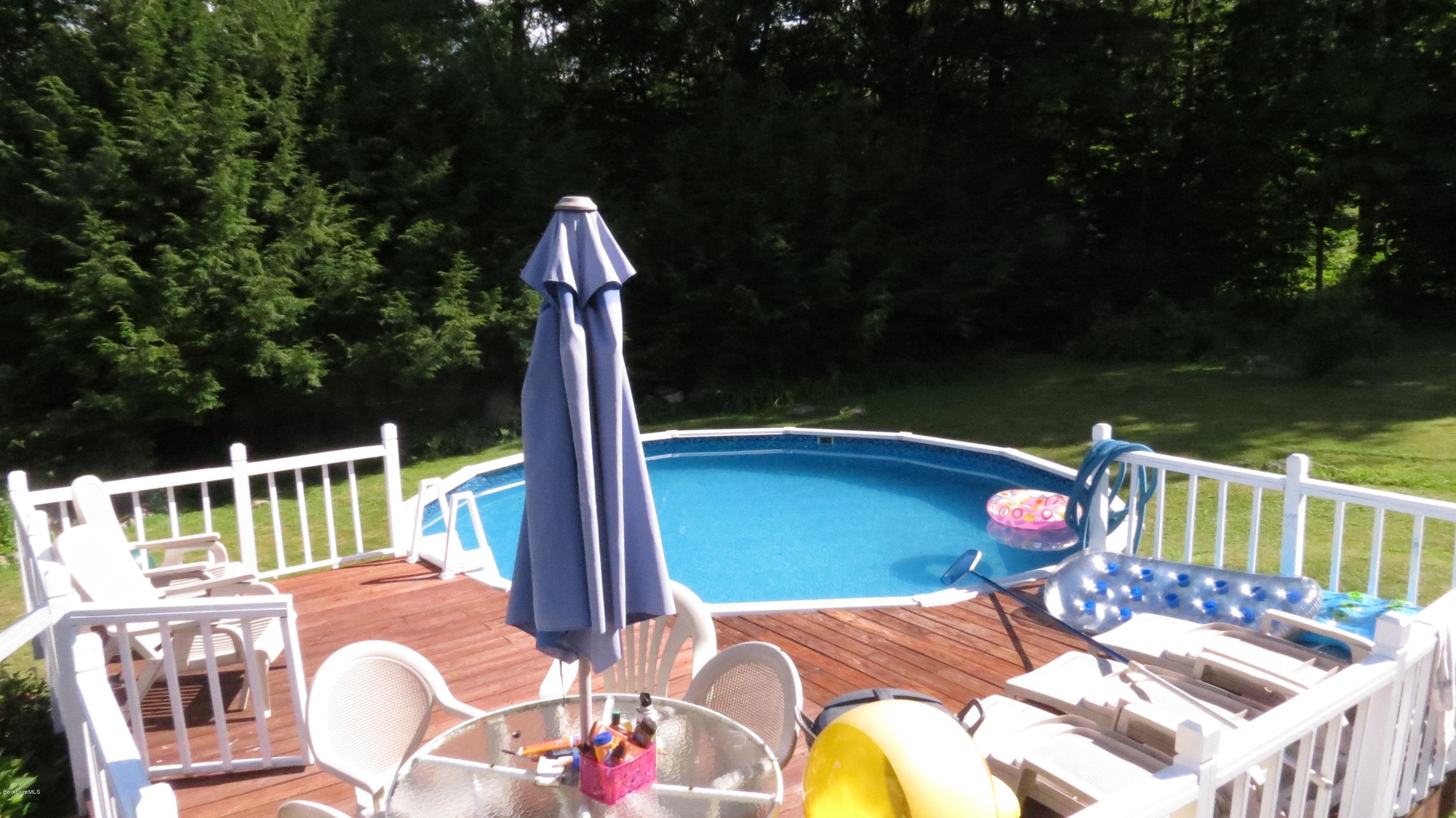 1080 Middle Road Clarksburg, MA 01247 - Photo 8 of 39 a view of a chairs and tables in the patio