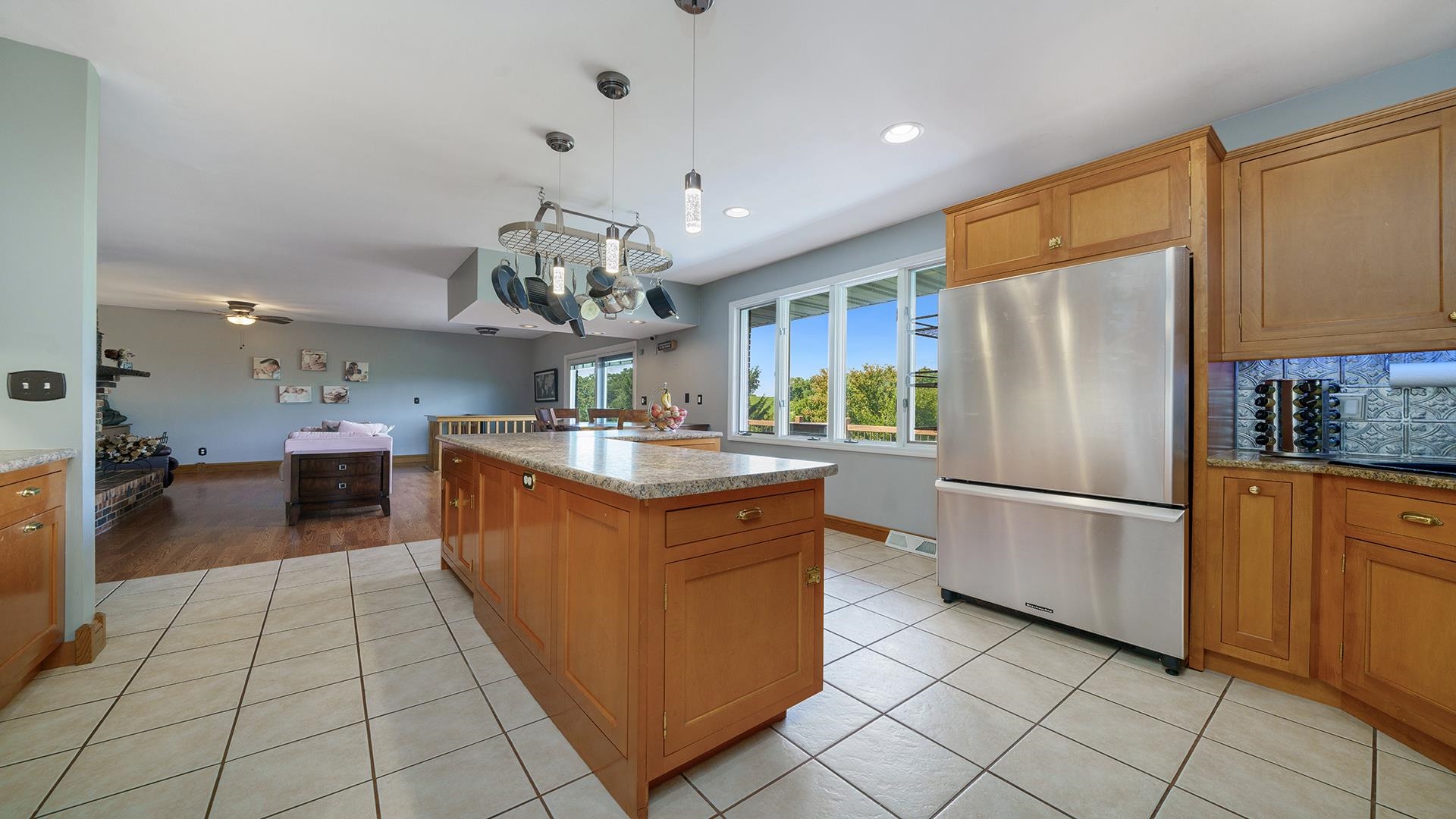 3300 North Silver Ridge Drive Oregon, IL 61061 - Photo 13 of 56 a kitchen with stainless steel appliances granite countertop a refrigerator and a sink