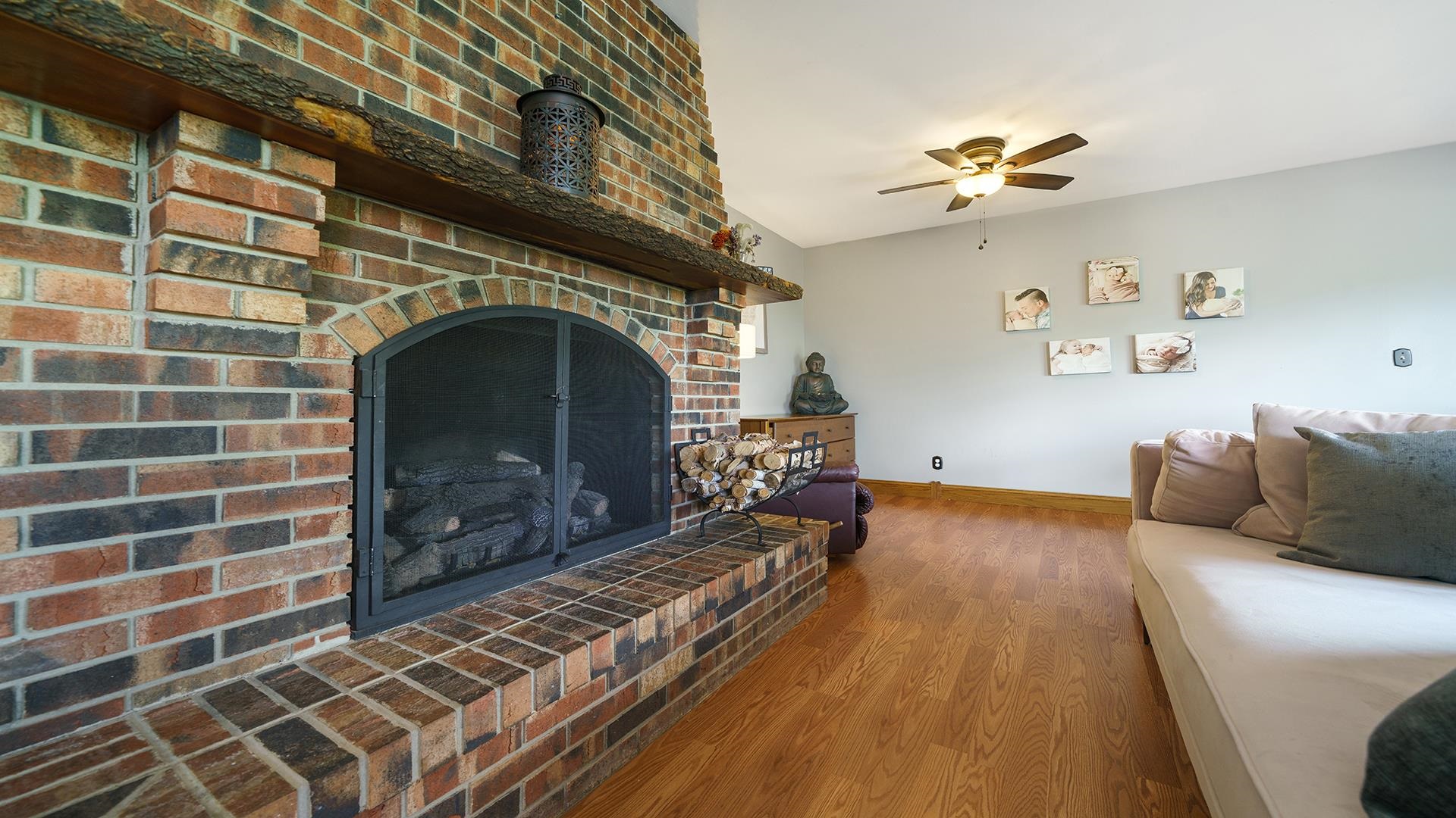 3300 North Silver Ridge Drive Oregon, IL 61061 - Photo 19 of 56 a living room with a couch and a fireplace
