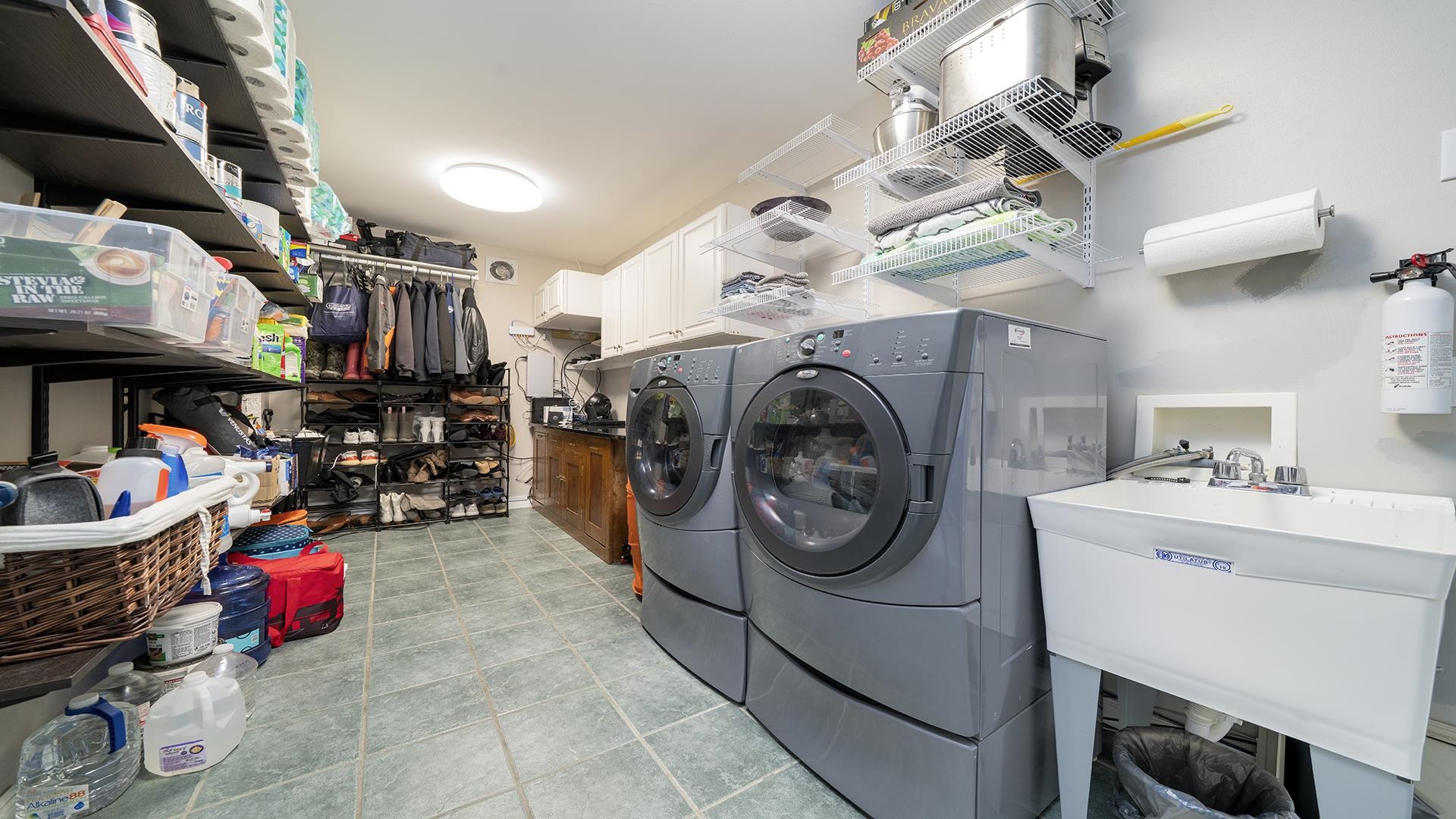 3300 North Silver Ridge Drive Oregon, IL 61061 - Photo 20 of 56 a storage room with washer and dryer