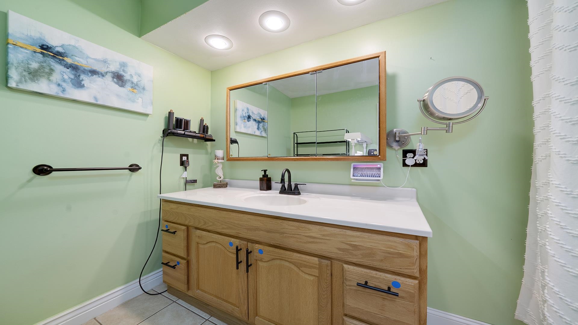 3300 North Silver Ridge Drive Oregon, IL 61061 - Photo 21 of 56 a bathroom with a sink and a mirror