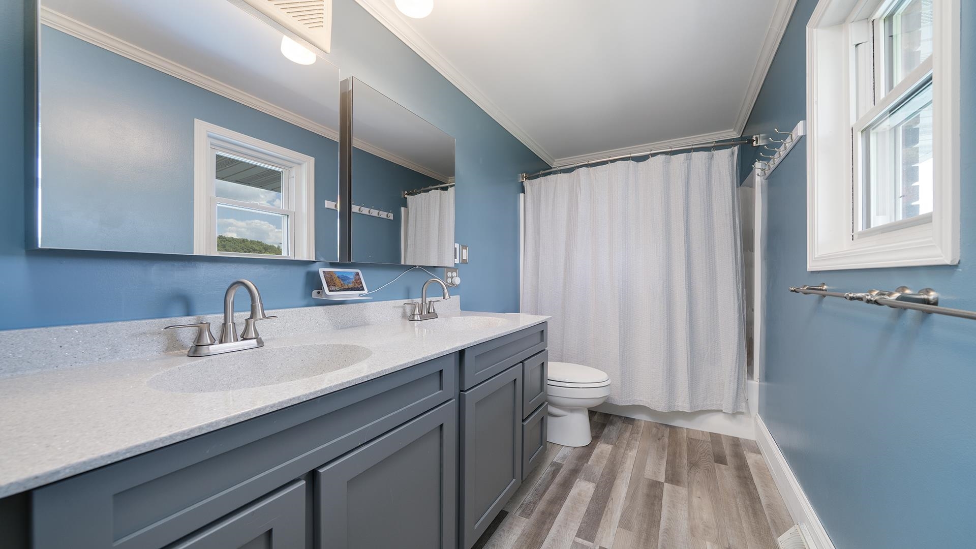 3300 North Silver Ridge Drive Oregon, IL 61061 - Photo 25 of 56 a bathroom with a sink a toilet and a mirror