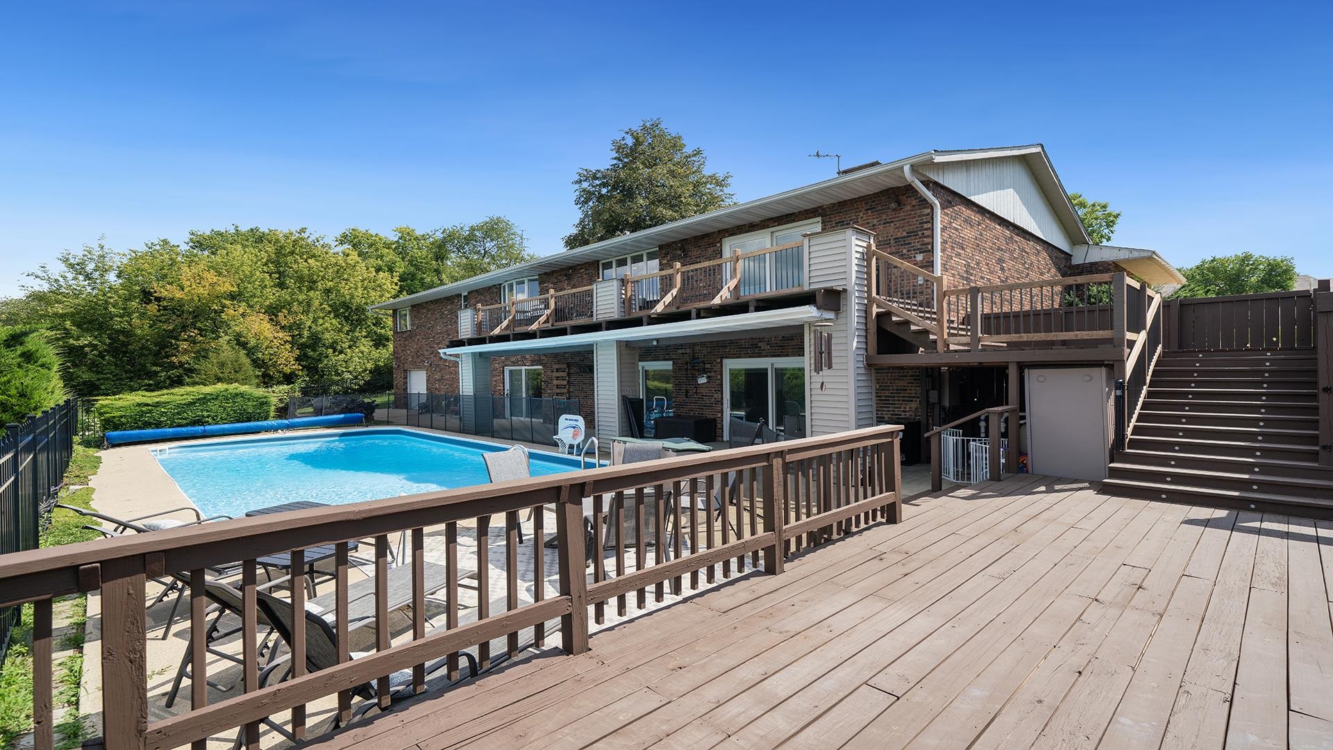 3300 North Silver Ridge Drive Oregon, IL 61061 - Photo 3 of 56 a view of house with a deck and furniture