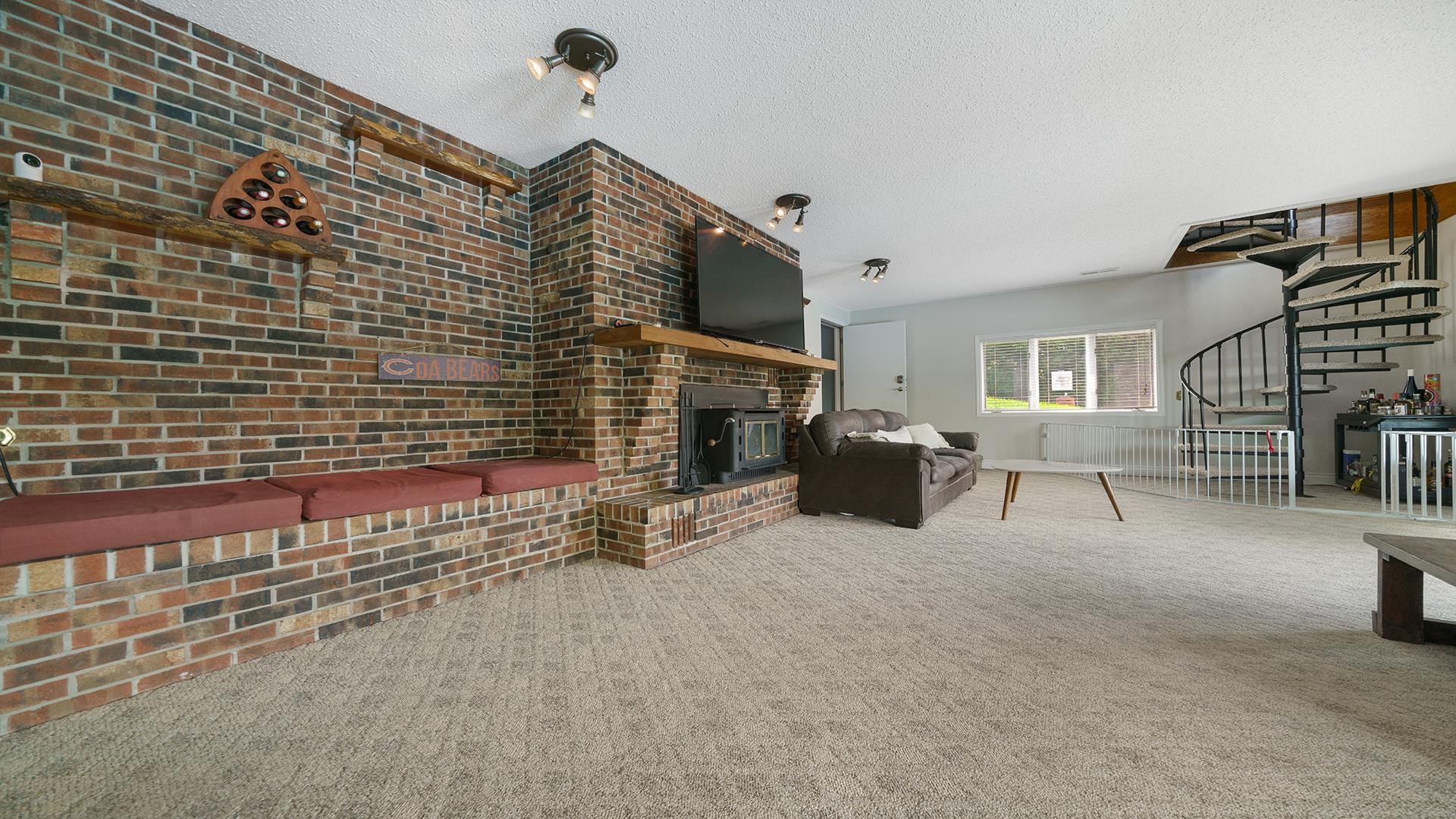 3300 North Silver Ridge Drive Oregon, IL 61061 - Photo 32 of 56 a view of an empty room with fireplace and a window